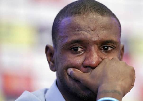 Eric Abidal showed his emotions as he said farewell at the Nou Camp. Picture: Reuters
