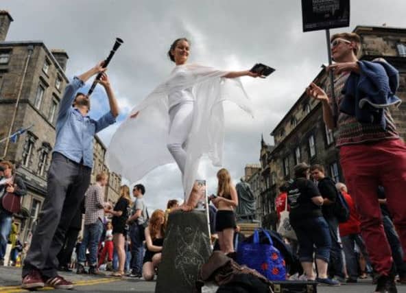 Fringe Street performers on the Royal Mile. Picture: Ian Rutherford