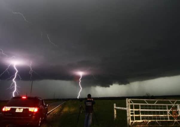 Lightning strikes seen in Oklahoma as a tornado killed five and injured dozens of people. Picture: Reuters