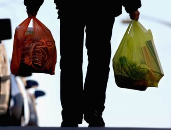 Researchers found that a tax on plastic carrier bags in Wales introduced in 2011 reduced their use by up to 80 per cent in supermarkets. Picture: Getty