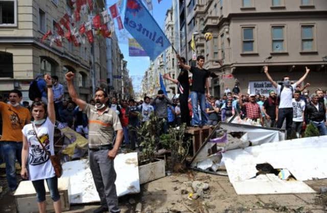Protesters chant anti-government slogans during a demonstration sparked by the demolition of Taksim Gezi Park, Taksim Square, Istanbul. Picture: Getty