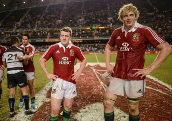 Richie Gray and Stuart Hogg of the British and Irish Lions look on after their victory. Picture: Getty