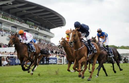 Jockey Ryan Moore rides Ruler of the World  to victory. Picture: Getty