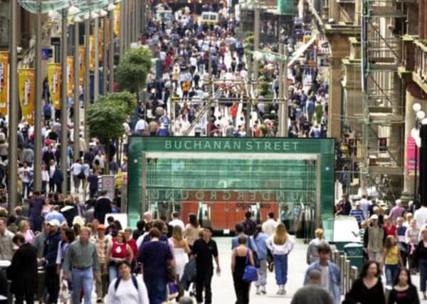 Shoppers in Glasgow's Buchanan Street. Scots shoppers are the most unhappy in the UK, according to a new survey. Picture: TSPL