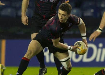 Sean Kennedy, helping his Edinburgh side to a win over eventual PRO12 finalists Ulster earlier this year. Picture: SNS