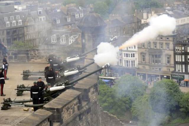 A 21-Gun Royal Salute is fired at Edinburgh Castle. Picture: Greg Macvean