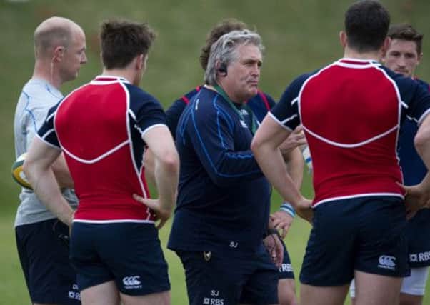 Acting head coach Scott Johnson dishes out instructions to the Scotland players during training in Durban yesterday. Picture: SNS