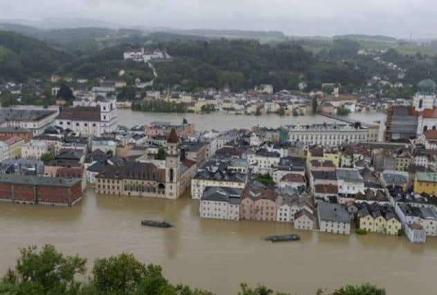 The Inn and Danube have burst their banks, flooding Passau in Southern Germany. Pictures: Getty/AFP