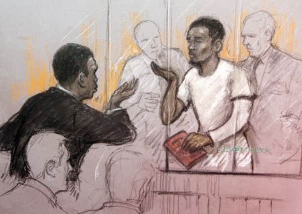 A member of the public gallery blew kisses at Michael Adebolajo in the dock at Westminster Magistrates Court. Picture: PA