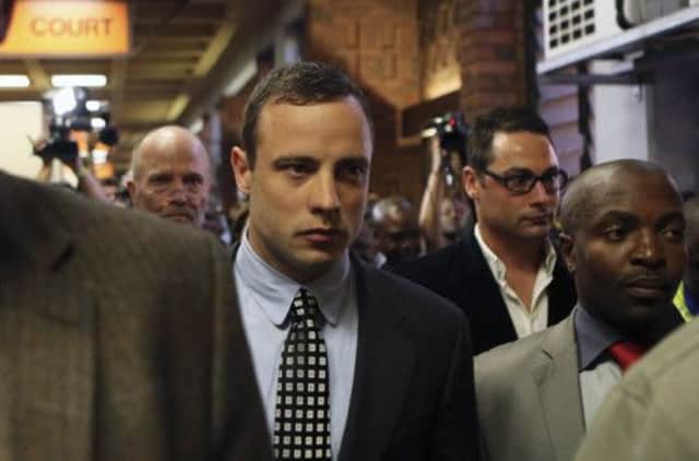 Oscar Pistorius leaves after court proceedings on Tuesday. Picture: Getty