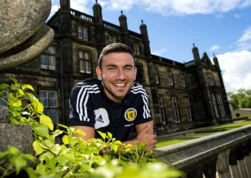 Robert Snodgrass enjoying the sunshine ahead of Scotland's game against Croatia. Picture: SNS