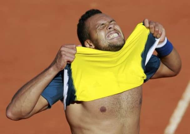 Jo-Wilfried Tsonga cannot contain his joy after winning yesterdays quarter-final. Picture: Reuters