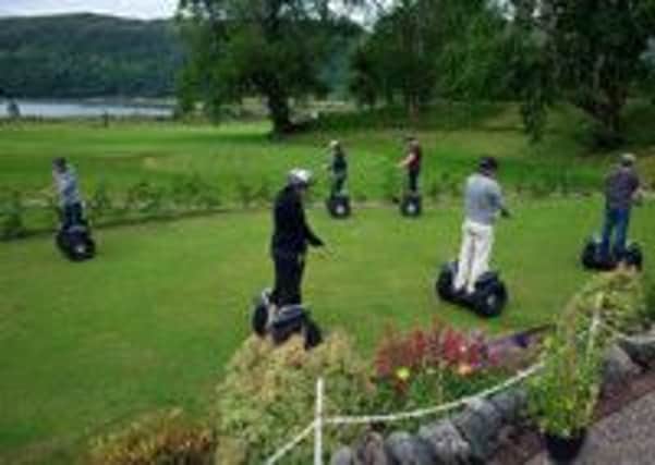 Segways on the Golf course, Scotland. © Stephen McLaren