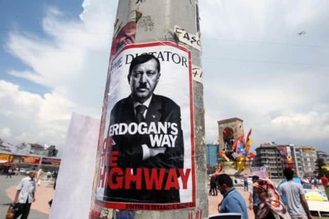 A picture of Prime Minister Erdogan, altered to look like Adolf Hilter in Taksim. Picture: AP