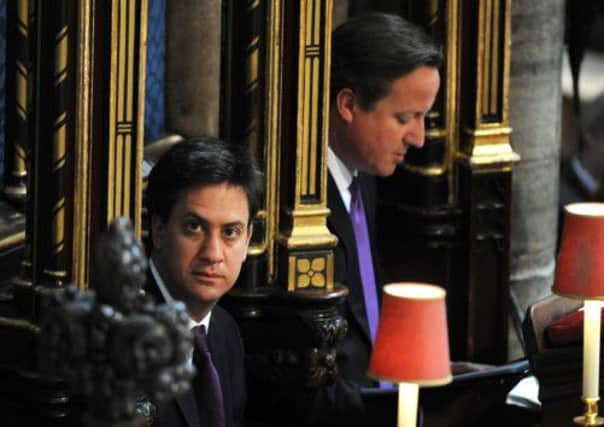 Ed Miliband and  David Cameron during the service to celebrate the 60th anniversary of the Queen. Picture: Getty