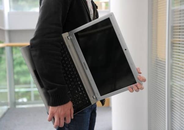 The laptops were stolen in May last year. Picture (posed by model): Jane Barlow