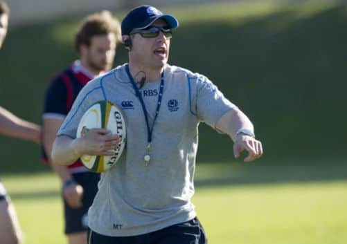 Scotland coach Matt Taylor passes on instructions at training. Picture: SNS