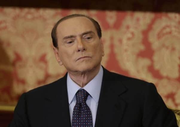 Silvio Berlusconi: former aide recruited prostitutes. Picture: AP