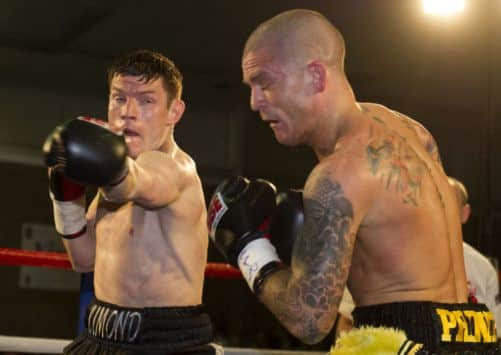 Willie Limond lands a left hook on Mitch Prince. Picture: SNS