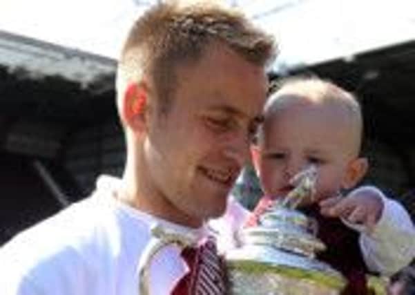 Danny Grainger with the Scottish Cup trophy. Picture: Jayne Wright