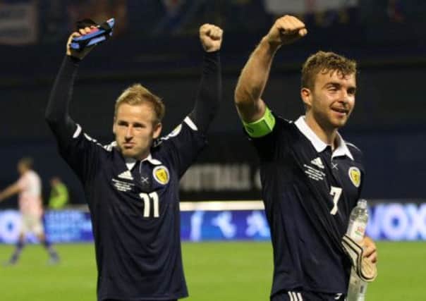 Scotland's Barry Bannan and James Morrison celebrate. Picture: PA