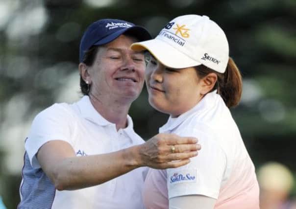 Catriona Matthew, left, hugs Inbee Park after the South Korean won the LPGA Championship. Picture: Getty