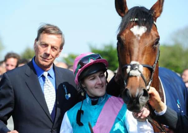 Sir Henry Cecil with Tom Queally and horse Frankel. Picture: PA