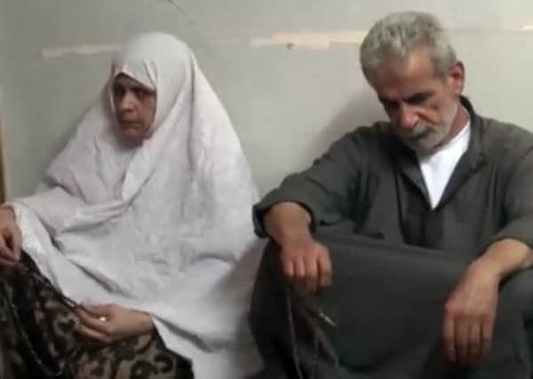 The parents of the teen killed by Syrian rebels. Screengrab: Getty/AFP/YouTube