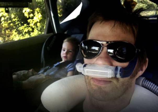 Neil with his baby son, Oscar. Picture: complimentary