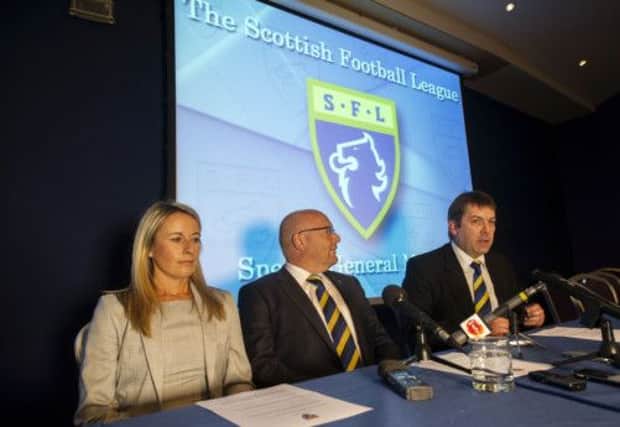 Claire McCracken (left), SFL Chairman Jim Ballantyne (centre) and SFL Chief Executive David Longmuir. Picture: SNS