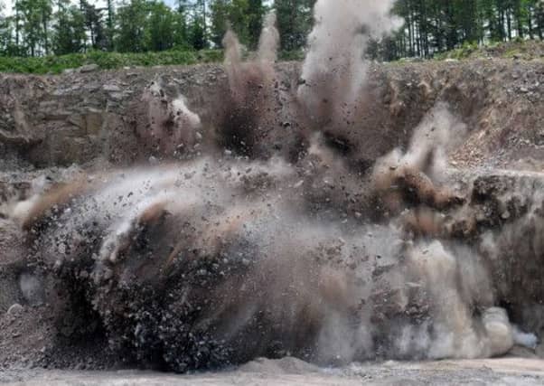 40,000 tonnes of granite is blown up in Criagenlow Quarry, Aberdeenshire. Picture: Hemedia/SWNS