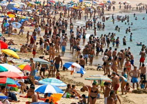 Holidaymakers may find their costs rising with frequent use of debit and credit cards aborad. Picture: Getty