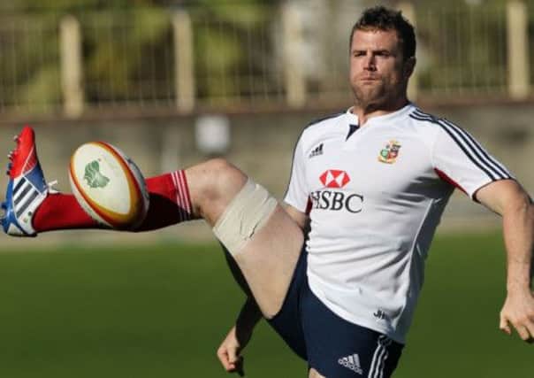 Lions No 8 Jamie Heaslip shows off his football skills during yesterdays Sydney training session. Picture: PA
