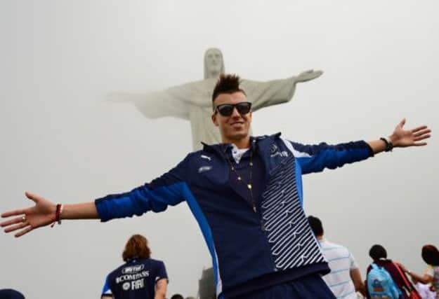 Italy forward Stephan El Shaarawy poses in front of the Christ The Redeemer statue above Rio de Janeiro. Picture: AFP/Getty