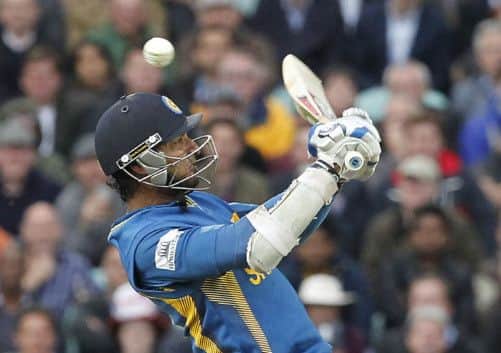 Sri Lankas Kumar Sangakkara takes evasive action on his way to a matchwinning 134 not out against England. Picture: AFP/Getty
