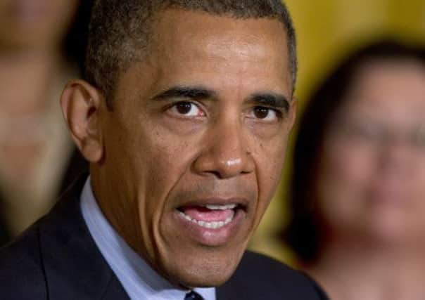 Barack Obama has made clear such proof would trigger greater American involvement. Picture: AP