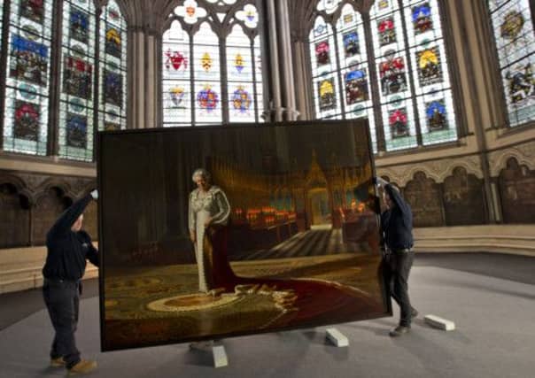 The portrait of the Queen by Ralph Heimans was been vandalised with spray paint. Picture: Getty