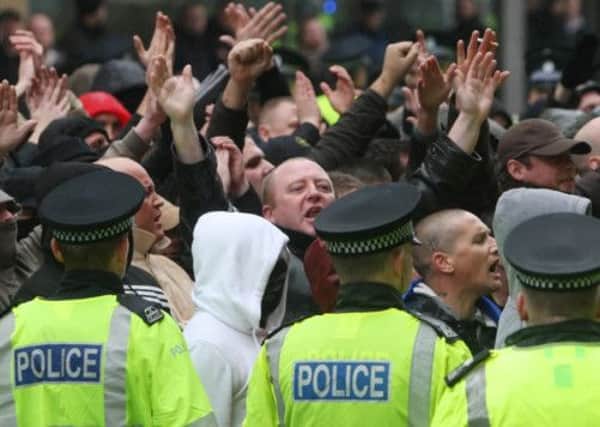 Members of the Scottish Defence League demonstrate in Glasgow. Picture: PA