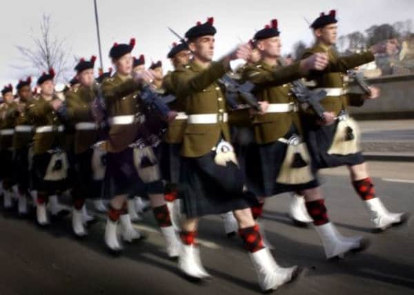 Members of the Black Watch march in Perth. Picture: TSPL