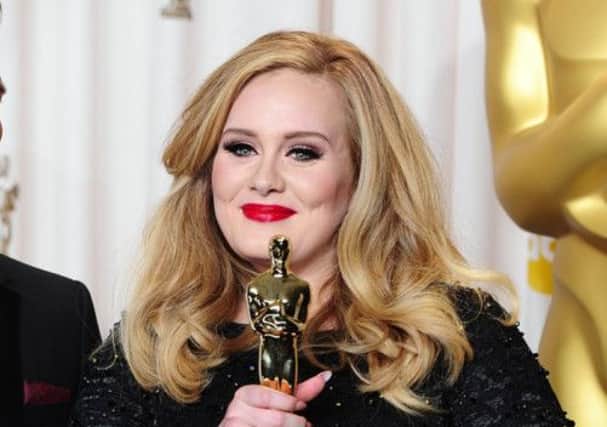 Adele received an MBE in the Queen's Birthday Honours List. Picture: PA