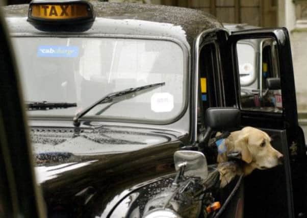 Taxi drivers in Aberdeen have refused to allow guide dogs on board, it has been alleged. Picture: PA