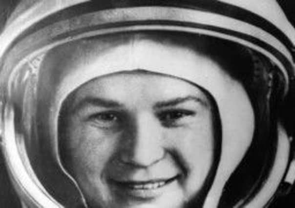 Valentina Tereshkova, who became the first woman in space, photographed in her space suit shortly before take off. Picture: Getty