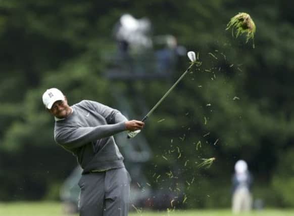 Injured Woods takes rough with the smooth as he plays the long game on 'short' course that makes it hard for best to excel. Picture: Reuters