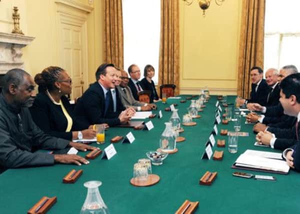 David Cameron hosts a pre-G8 meeting with Overseas Territories and Crown Dependencies leaders. Picture: PA