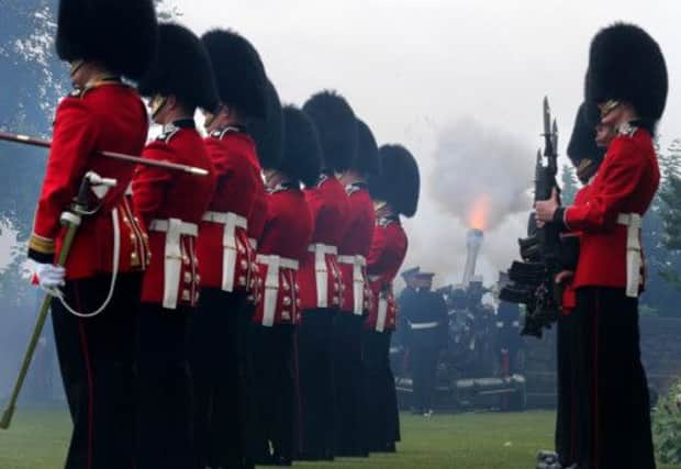Gunners from the 105th Regimental Royal Artillery fire a 21 gun Royal Salute at Stirling Castle. Picture: PA