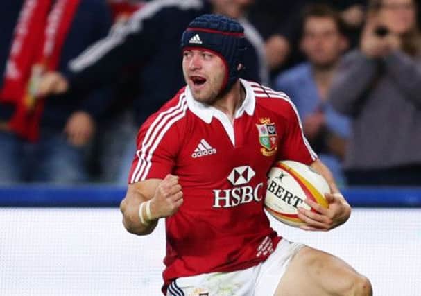 Leigh Halfpenny of the Lions celebrates after scoring a try. Picture: Getty