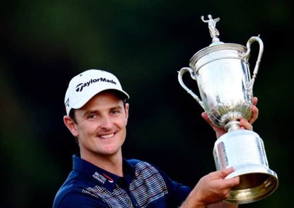 Justin Rose celebrates with the U.S. Open trophy. Picture: Getty