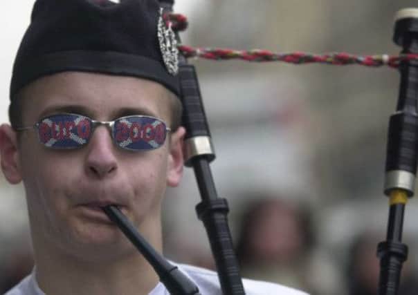A Tartan Army fan plays the bagpipes in 2007. Picture: Getty