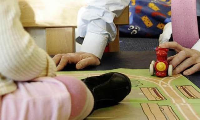 Holyrood's Equal Opportunities Committee said the lack of comprehensive child care is one of the key barriers to women achieving their potential in the workplace. PIcture: PA