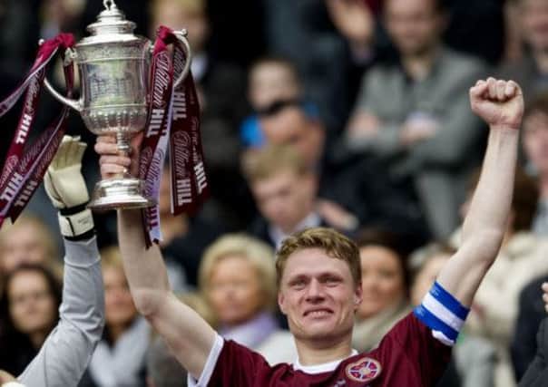 Just a year after captain Marius Zaliukas lifted the Scottish Cup, Hearts are in turmoil. Picture: SNS